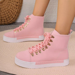 Pink lace-up platform sneakers with D-ring eyelets and white soles