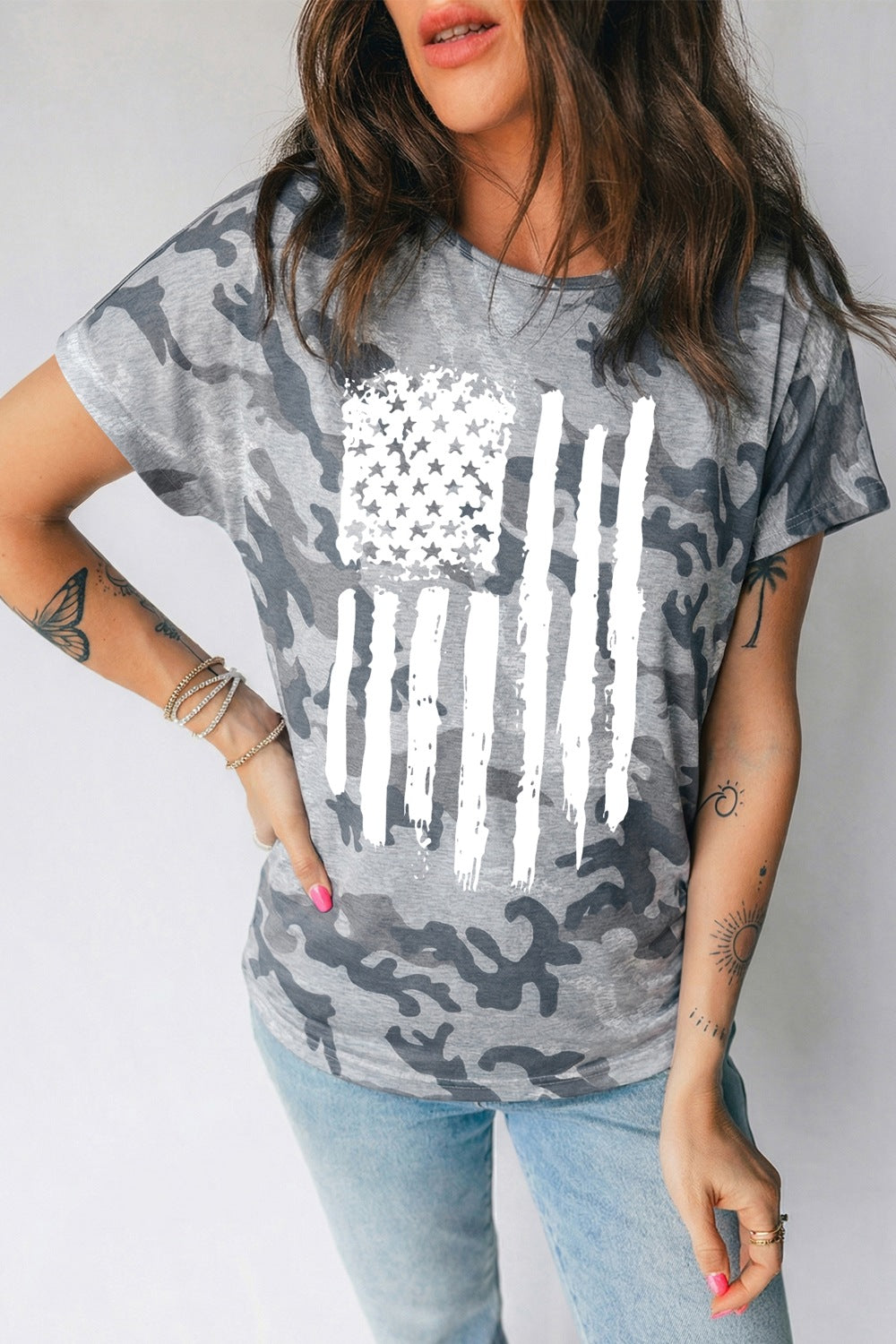 Grey camouflage crew neck t-shirt with distressed white American flag graphic.