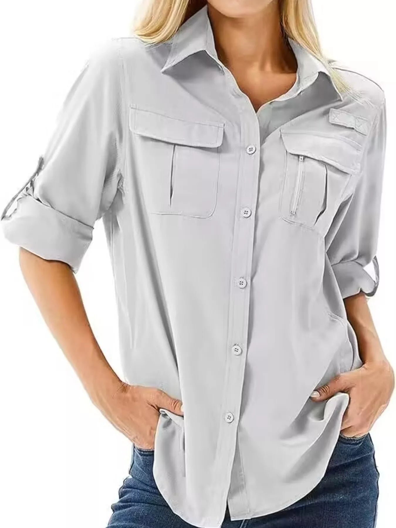 Light gray button-up shirt with roll-up sleeves and chest pockets.
