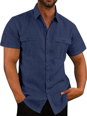 Classic short sleeve button-down shirt in navy blue with two chest pockets.
