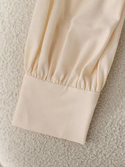 Apricot long sleeve blouse with gathered cuff detail