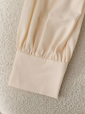 Apricot long sleeve blouse with gathered cuff detail