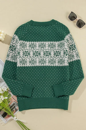 Dark green knit sweater with white snowflake fair isle pattern and small dot print.