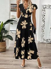 Black floral print midi dress with cap sleeves and a V-neckline.