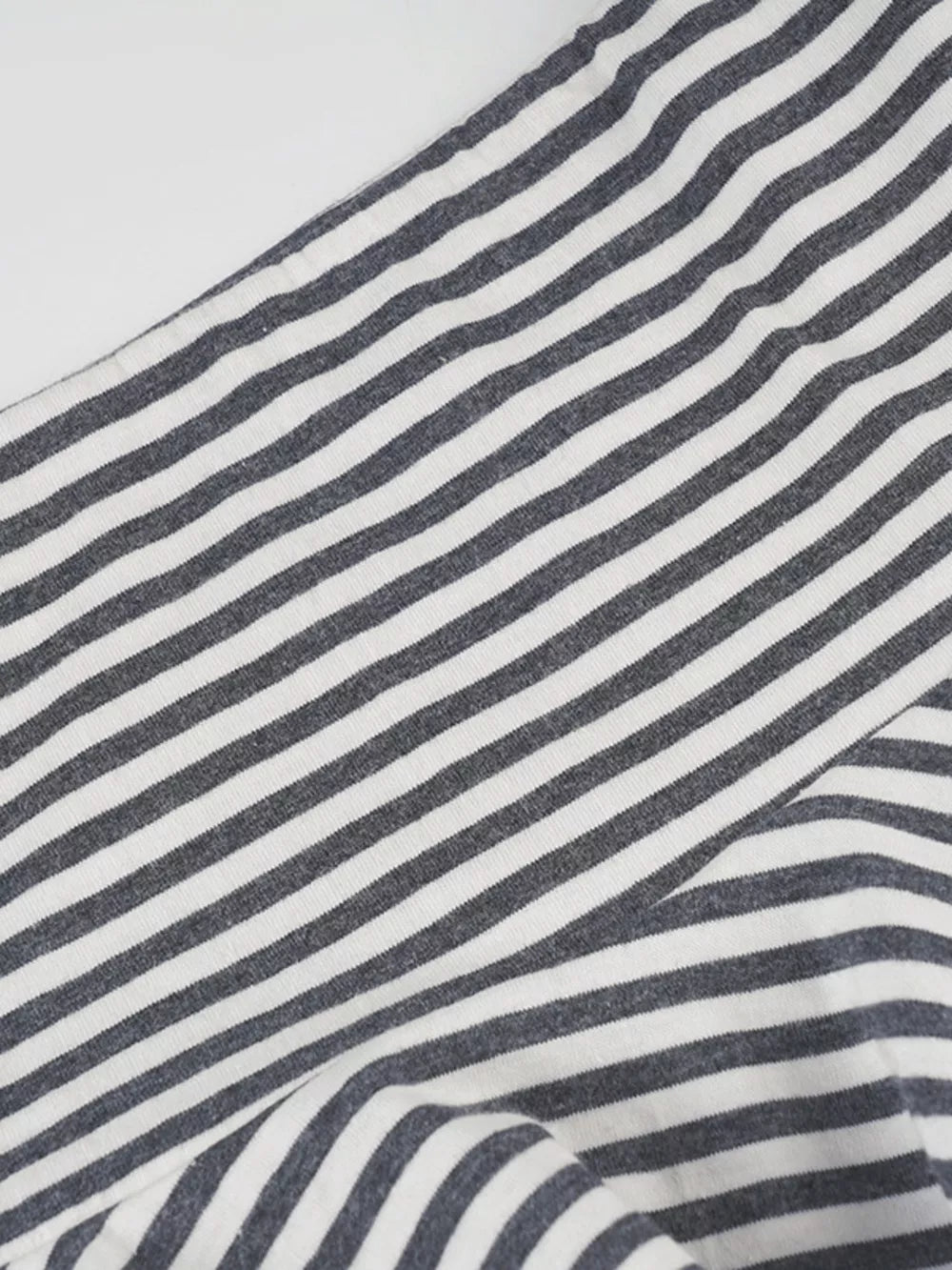 Asymmetrical hem mini skirt in black and white stripes