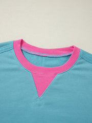 Colorblock Patchwork Crew Neck Sweatshirt in Teal, model styling view