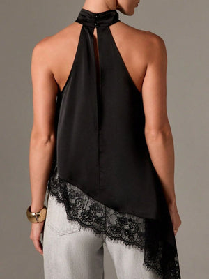 Black halter camisole with lace trim detail and a keyhole back.
