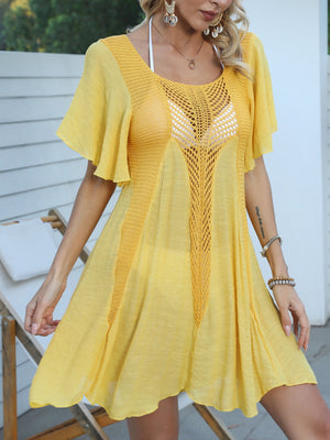Yellow crochet inset beach cover-up dress with flutter sleeves and A-line cut.