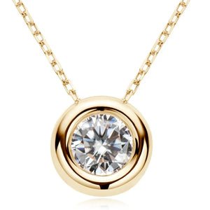 Gold solitaire pendant necklace with bezel-set diamond on a delicate chain.