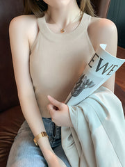 Apricot ribbed knit cami tank top with a crew neck.