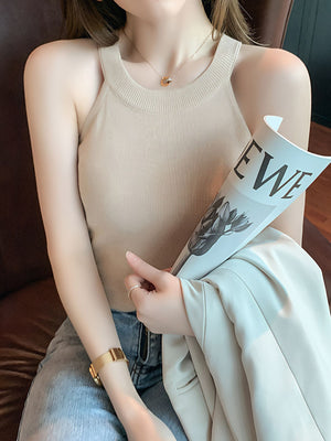 Apricot ribbed knit cami tank top with a crew neck.