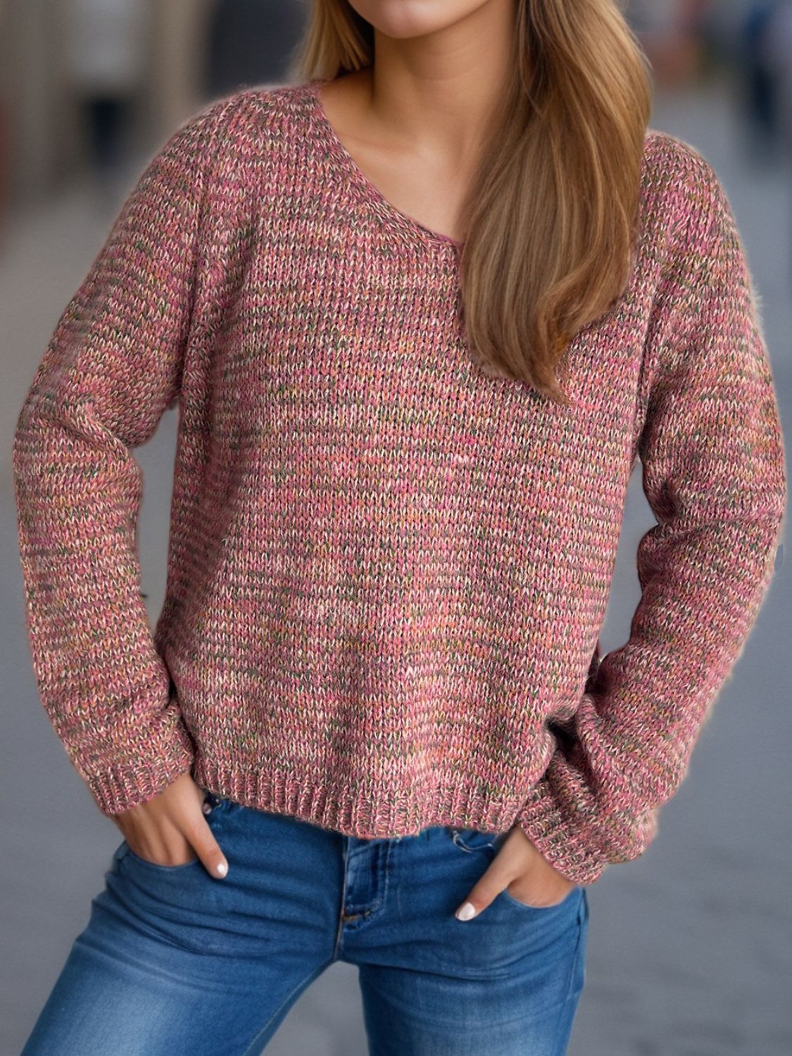 Textured slouch v-neck sweater in dusty pink with multi-color flecks, acrylic knit.