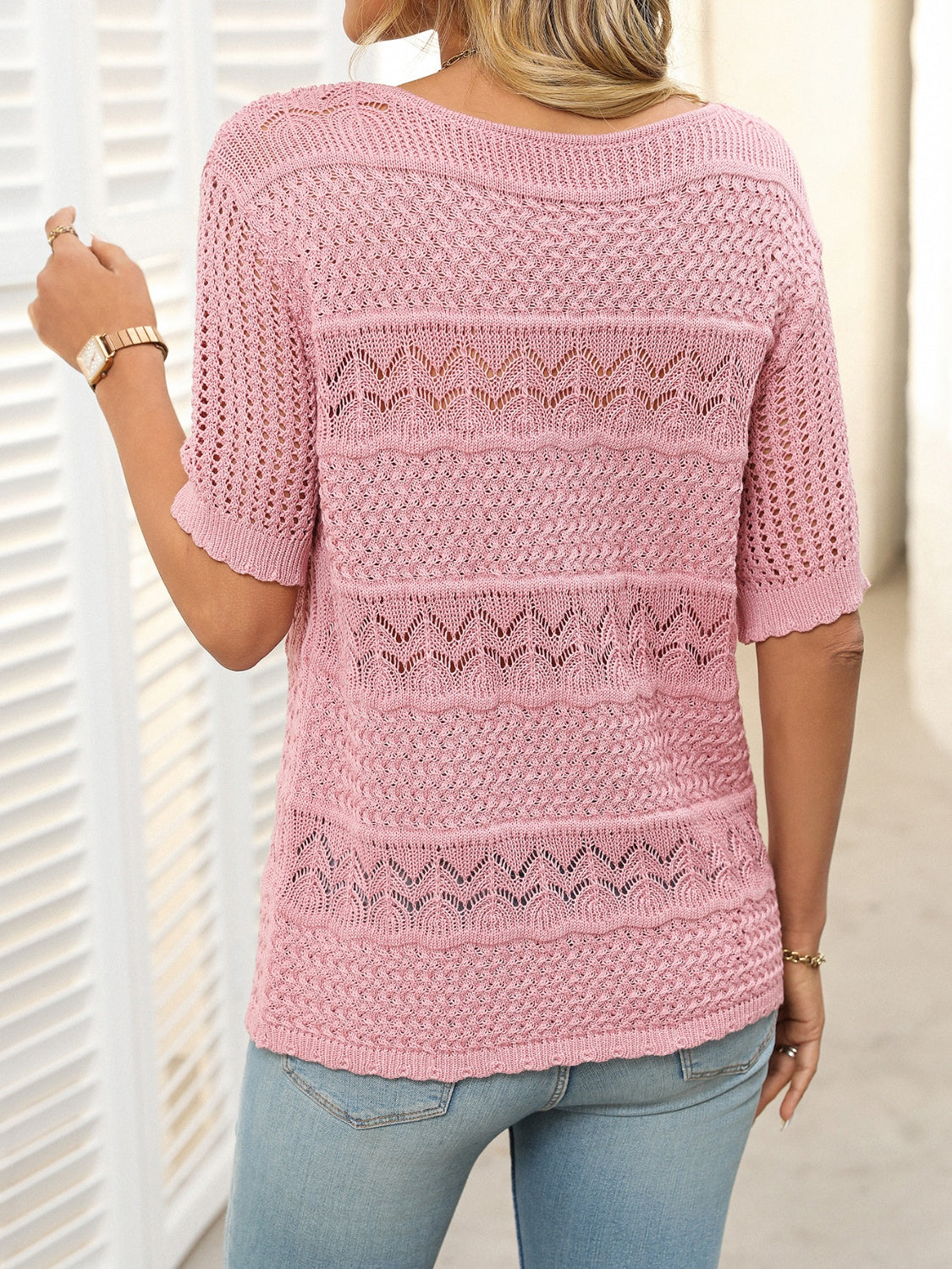 Breezy Babel half-sleeve knit sweater in Blush Pink with openwork stripe details.