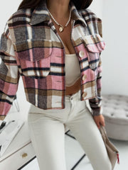 Cropped plaid shacket in pink with oversized chest pockets and button front.