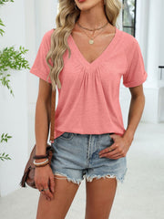 Pink ruched V-neck short sleeve t-shirt with elastane for comfort.