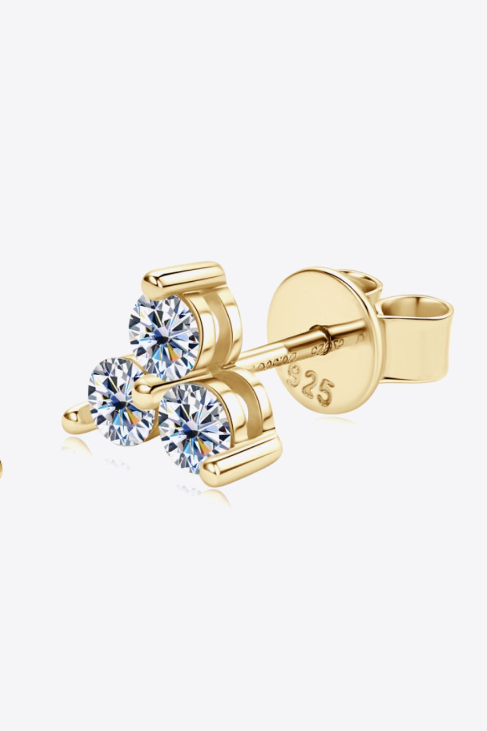 Gold trilogy moissanite stud earrings in 925 sterling silver with a blossom design.