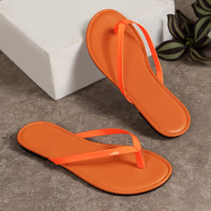 Orange minimalist toe-post sandals with thin straps.