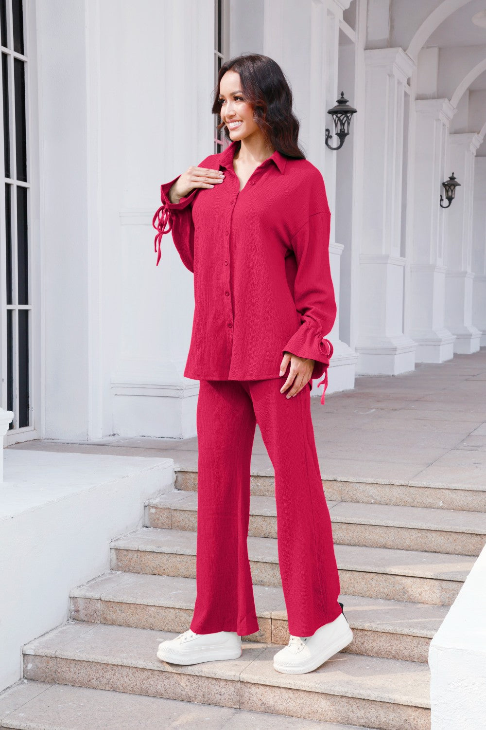 Hot Pink textured tie-sleeve co-ord set with wide leg pants and button-up shirt.
