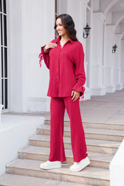 Hot Pink textured tie-sleeve co-ord set with wide leg pants and button-up shirt.