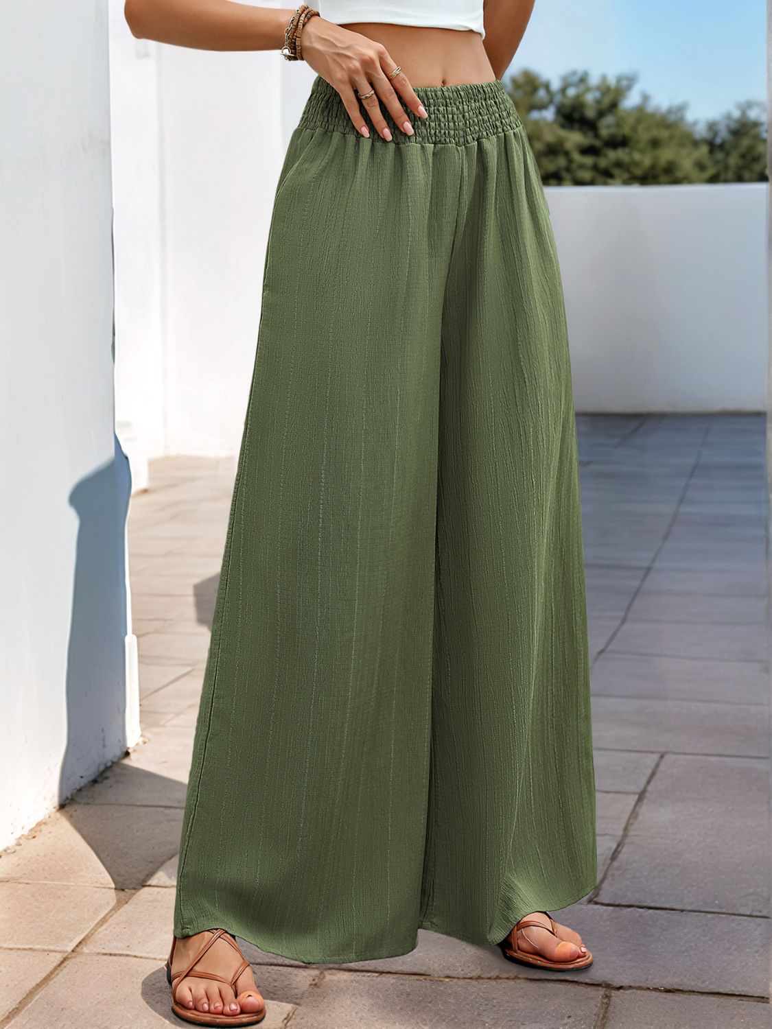 Moss textured elastic waist palazzo trousers with a wide leg