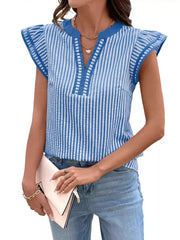 Blue vertical stripe blouse with ruffle sleeves and V-neckline, paired with jeans.