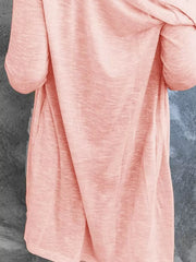 Watermelon pink cotton blend cardigan with long sleeves and pockets.