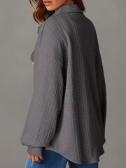 Dark Gray textured oversized button-down shacket with a collared neckline and long sleeves.
