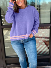 Plus size purple knit sweater with pink striped cuffs and hem