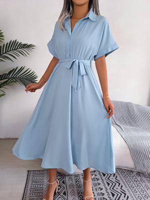 Light blue button-down midi dress with short sleeves and tie belt
