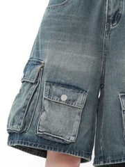 Men's light wash denim cargo shorts with multiple button-flap pockets.