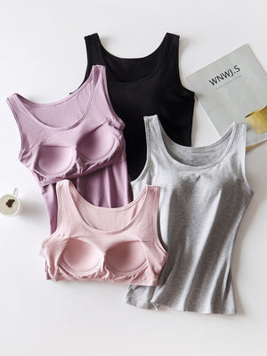 Built-in support tank tops in blush, lilac, gray, and black with scoop necks.