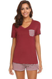 Burgundy V-neck lounge set with striped pocket and shorts.