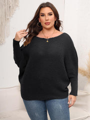Charcoal ribbed knit off-shoulder sweater with batwing sleeves and a boat neckline.