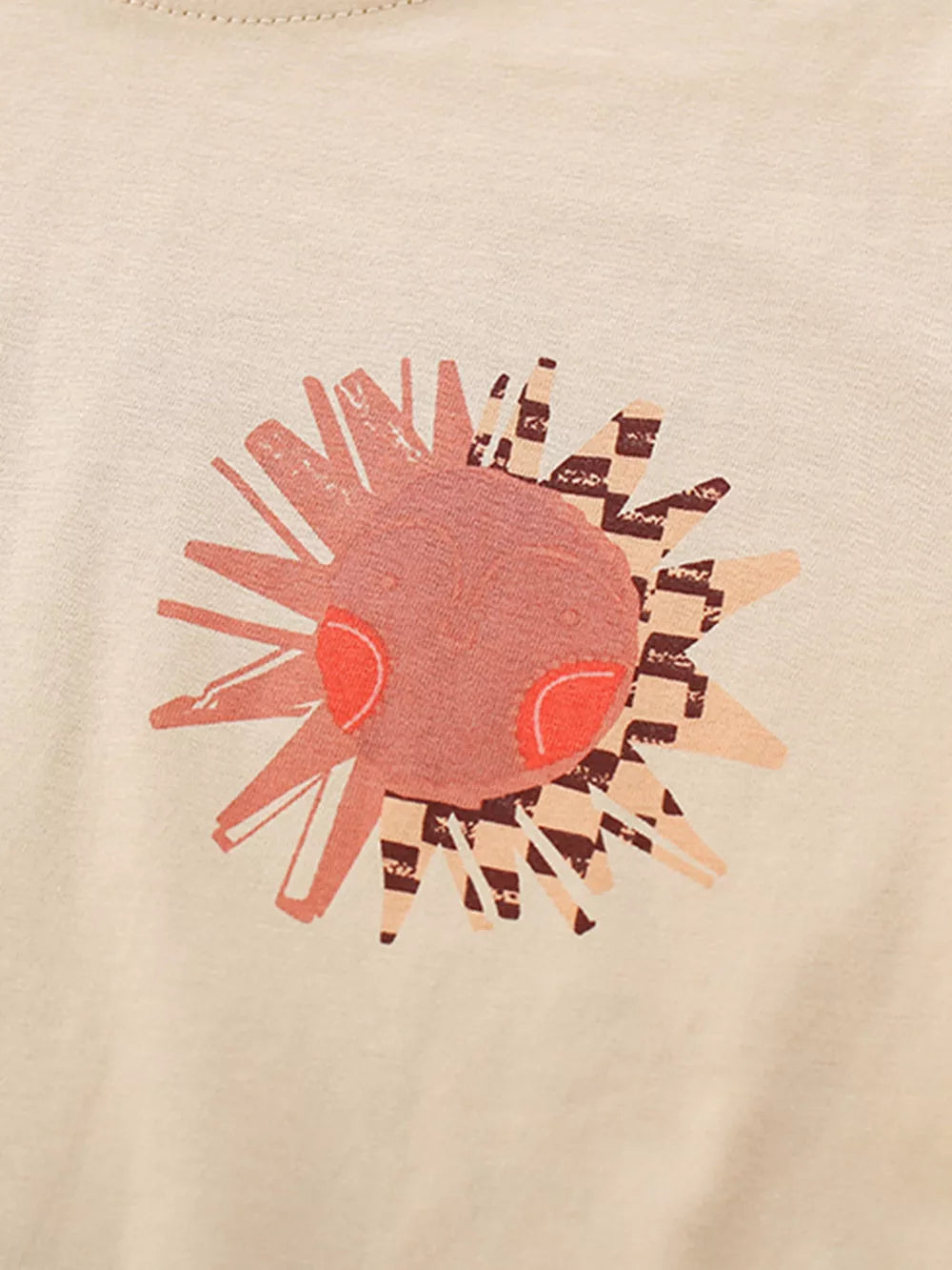 Toddler cotton set with a whimsical sun graphic in pink and beige with checkerboard accents.