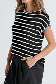 Black and white striped boxy tee with contrast trim neckline and sleeves.