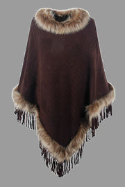 Chocolate knit poncho with faux fur trim and fringe detail