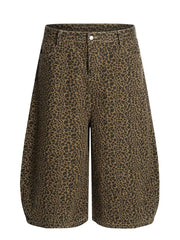 Men's brown leopard print wide-leg capri track pants with pockets.