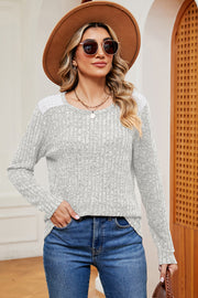 Light Gray ribbed knit top with eyelet shoulder detail and crew neck.