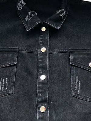 Black denim shirtdress with distressed collar and pocket details.