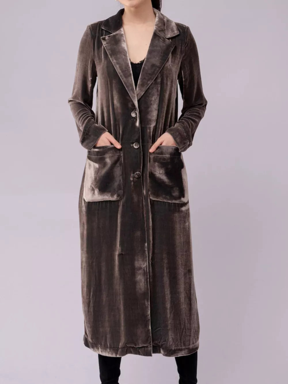 Longline velvet trench coat in grey with button front and flap pockets.