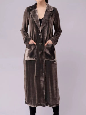 Longline velvet trench coat in grey with button front and flap pockets.