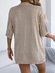Tan open-knit three-quarter sleeve cardigan with cable-knit detail on sleeves and sides