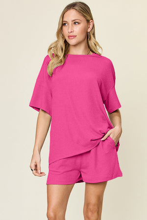 Waffle knit boxy tee and shorts set in hot pink with crew neck and short sleeves.