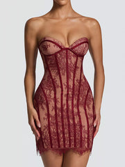 Burgundy lace overlay strapless mini dress with sweetheart neckline and bodycon fit.