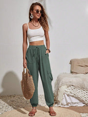 Textured cargo lounge trousers in Army Green with drawstring waist and cuffed ankles.