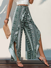 Geometric print palazzo pants in Air Force Blue with ruffle trim and side slits.