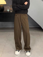 Men's brown relaxed fit wide leg sweatpants with front seam detail.