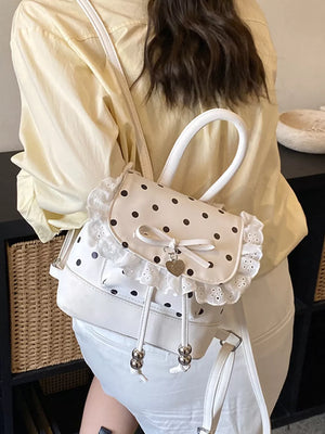 Cream white polka dot lace mini backpack with bow and heart charm