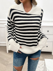 Wide collar stripe knit pullover sweater in black and white acrylic with ribbed cuffs.