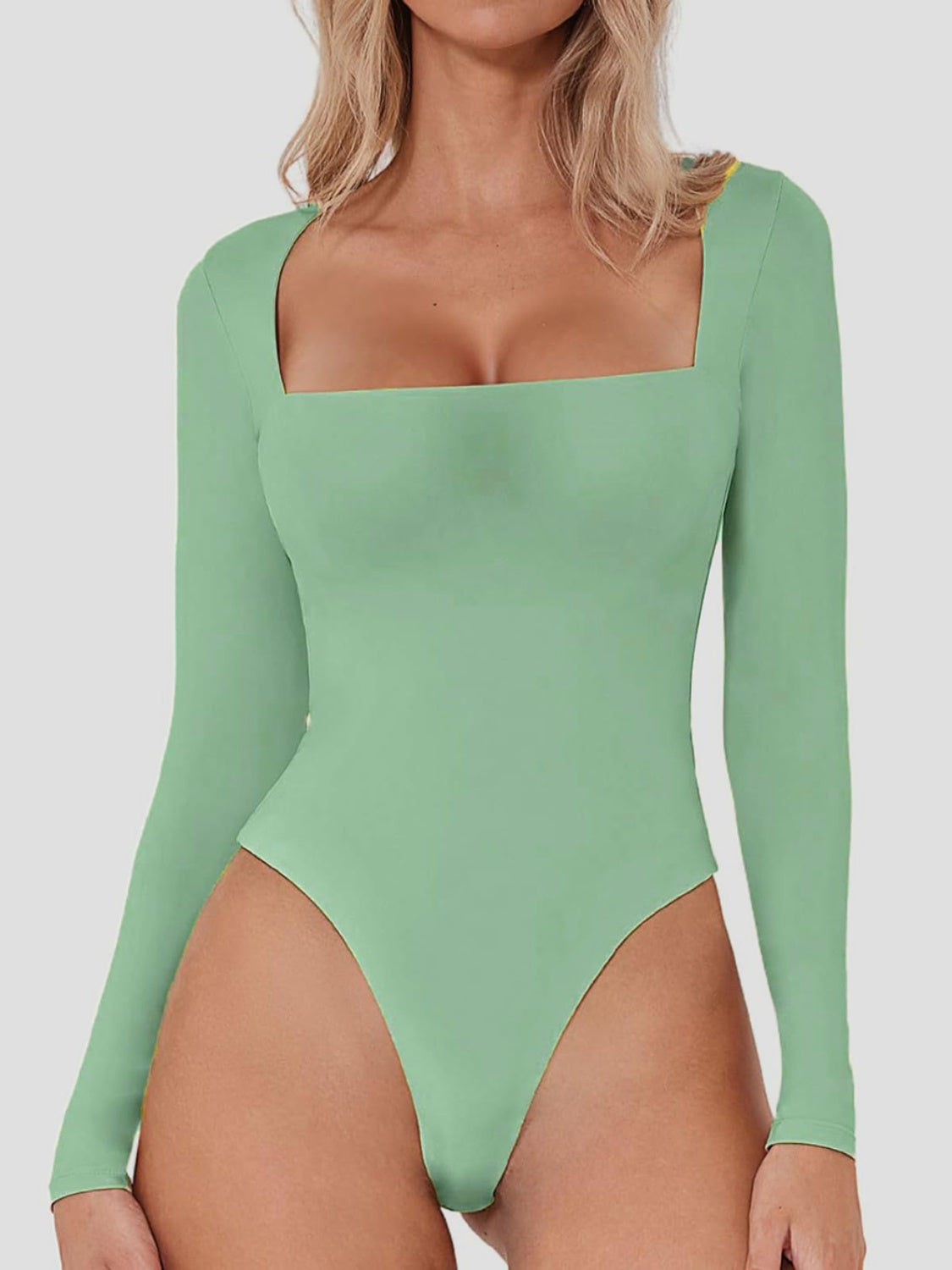 Long sleeve bodysuit in Tiffany Blue with a sculpted square neckline.